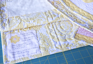 Sue Nickels teaches you to block and trim your quilt and how to add straight double binding with mitered corners and join the binding for a clean join.