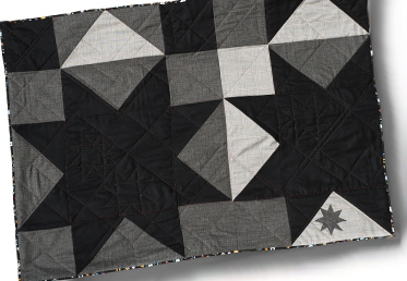 Kathy Doughty shows you her modern approach, using flying geese blocks with added applique. This quilt makes a bold, graphic statement but the project has a lot of flexibility so it can be reworked in many different arrangements. 