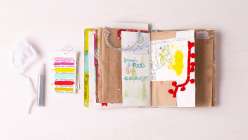 A colorful spread of pages in Dawn Sokol's art journal from her Holiday Art Journaling class on Creativebug.