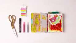 A colorful spread of pages in Dawn Sokol's art journal from her Holiday Art Journaling class on Creativebug.