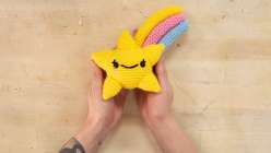 A pair of hands holding a stuffed crocheted star from Vincent Green-Hite's Crochet an Amigurumi Shooting Star Creativebug class