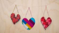 Three hanging, stuffed hearts from Rebecca Ringquist's Embroidered Heart Ornaments Creativebug class