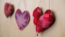 Three embroidered, stuffed hearts from Rebecca Ringquist's Embroidered Heart Ornaments Creativebug class