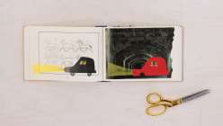 A two-page spread in a book with a small black car on the lefthand side and a red car on the right hand side from Creativebug's Altered Books Daily Practice class