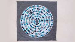 A circle quilted block by Sarah Bond from her Release the Geese Mini Quilt Top class on Creativebug