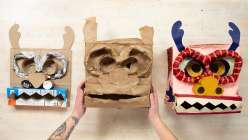 Three paper mache masks made by Katrina Wheeler in her Make a Paper Mache Dragon Head class on Creativebug