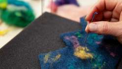 Melissa of Hex House Crowns felting a crown base her Wool Felting: Make an Heirloom Celebration Crown class on Creativebug