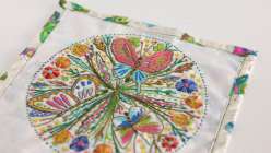 A close-up image of Rebecca Ringquist's Spring Fling Embroidery Sampler taught in her class on Creativebug.