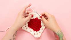 An in-progress project made in Twinkie Chan's Crochet a Strawberry Granny Square class on Creativebug