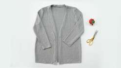 A grey mid-weight cardigan made in Sanae Ishida's Draft and Sew a Knit Cardigan class on Creativebug.