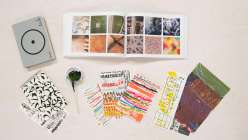 A selection of reference books and art materials from Courtney Cerruti's Creativebug class Find Your Creative Rhythm: 15 Ways to Spark & Sustain Art Making.