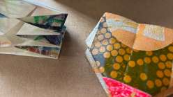 A folded Turkish Map Fold book made by e bond in her Creativebug Crafting Together live class.