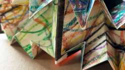 A folded Turkish Map Fold book made by e bond in her Creativebug Crafting Together live class.