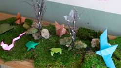 A folded paper selection of animal origami from Faith Hale's Origami Safari Daily Practice class on Creativebug