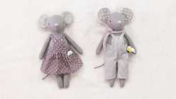 Two tiny gray sewn mice dolls made in Katia Ferris's Sew a a Mouse Doll class on Creativebug 