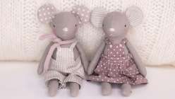 Two tiny gray sewn mice dolls made in Katia Ferris's Sew a a Mouse Doll class on Creativebug 