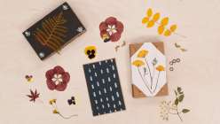 The components needed to make an upcycled flower press in Cobrina's class on Creativebug.