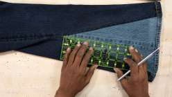 Sandra Lee Chandler turning a straight-leg pair of jeans into flare jeans in her Upcycled Denim: Side Seam Remix class on Creativebug.