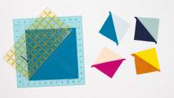  A square of fabric being measured in Faith Hale's How to Batch Cut Half Square Triangles class on Creativebug