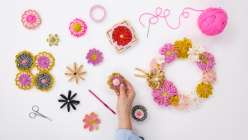 A selection of hand-loomed flowers made by crochet artist Twinkie Chan in her Flower Loom Basics class on Creativebug 