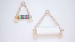 A macrame paper towel holder and organizer made by Cobrina in her Home Decor: Three Macrame Rope Projects class on Creativebug.
