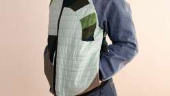 Sandra Chandler wearing a quilted jacket she made in her Upcycled Denim: Sew a Bomber Jacket class on Creativebug.