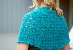 Fancy Tiger Crafts show you how to make a great knitting project with The Imposter’s Shawl. This hand made triangular shawl has basket weave stitches and scalloped edging appear to be woven and crocheted – but, in fact, it’s all cleverly knitted. 