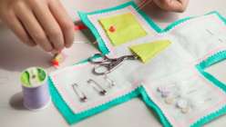 Learn how to create a colorful, travel-sized sewing kit with Annabel Wrigley of Little Pincushion Studio. This simple sewing project uses a pattern template for cutting out felt pieces, and the sewing instructions are easy for new sewists to follow.