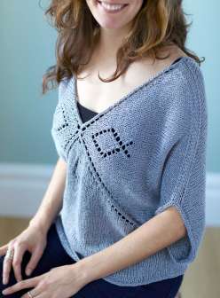 this lightweight pullover is perfect for spring and transitional weather. The unusual construction of the sweater is part of what makes it so fun to knit – the front and back are both started at the center and worked outward in rows of easy lace. 